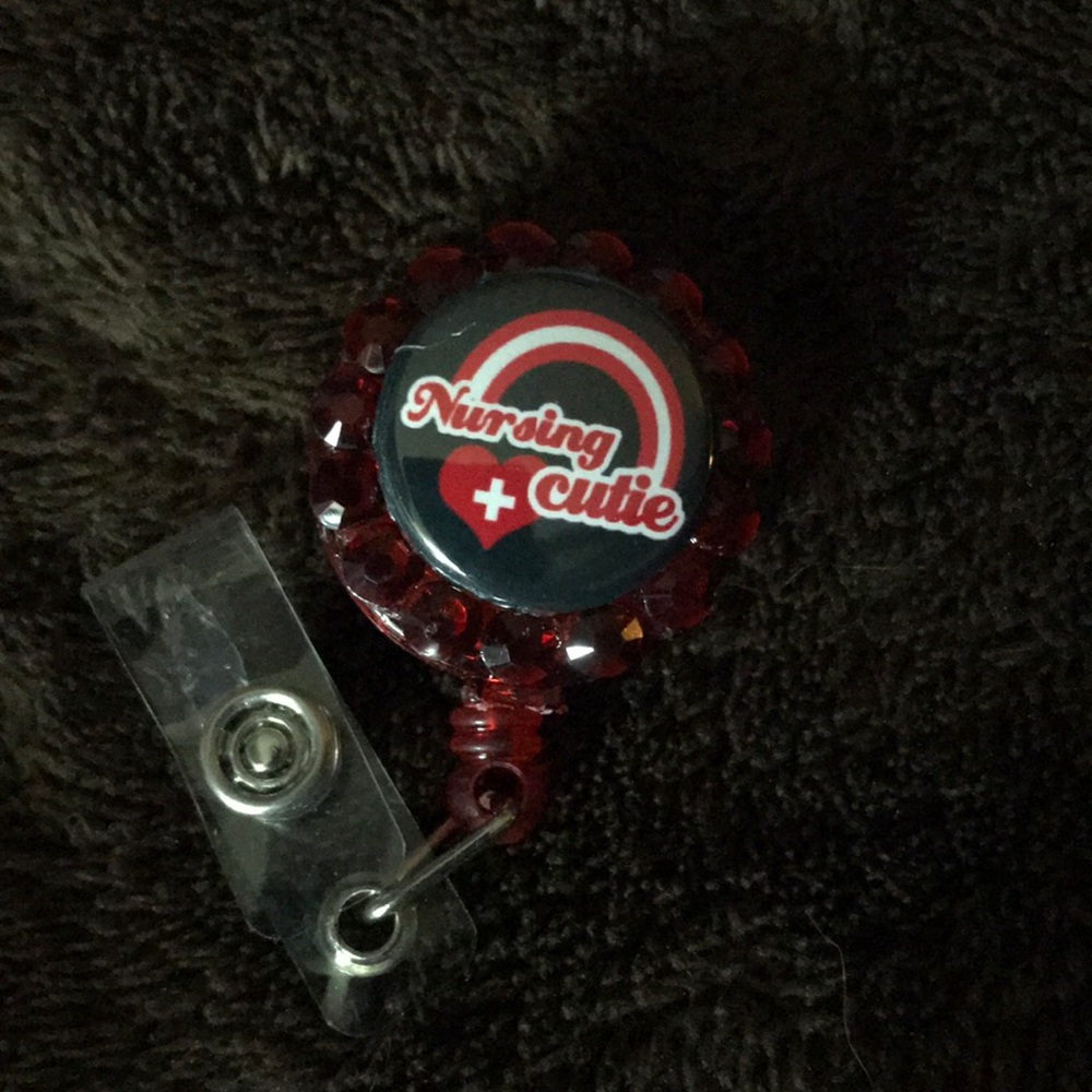 3/$35 Red nursing badge reel